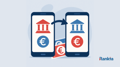 Dos móviles con apps bancarias y flecha de transferencia entre ellos, representando cuánto tarda una transferencia de un banco a otro en España