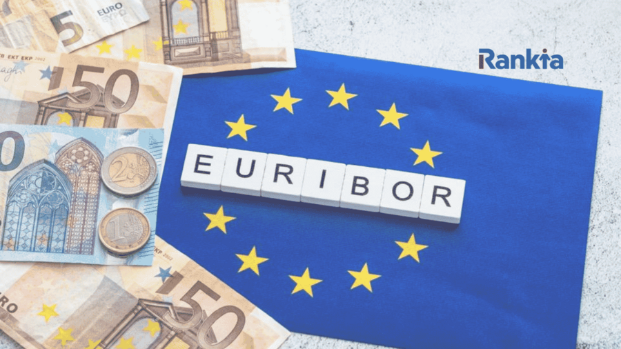 Letras que forman la palabra euríbor sobre una bandera de la Unión Europea, rodeada de billetes y monedas de euro